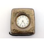 Motoring interest:- a brass eight-day dashboard clock with provision for dashboard mounting and