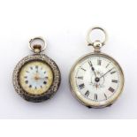 Two early 20th century silver fob watches, each with decorated enamel dials, engraved four piece