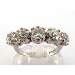 A five stone diamond ring, set with graduated mine cut stones, the central stone approx. 5mm