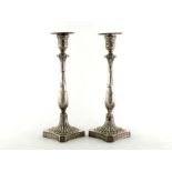 A pair of George III neo-classical silver candlesticks by Matthew Boulton & John Fothergill,