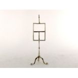 A novelty silver menu holder in the form of an artist's easel, by the Goldsmiths & Silversmiths
