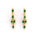 A pair of jade and seed pearl pendant earrings, the facetted round cut jade stones each 5.2mm