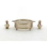 An Edwardian silver butter dish by Elkington & Co., Birmingham, 1909, pierced side handles