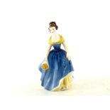 A ceramic Royal Doulton lady “Melanie”, with green backstamp.