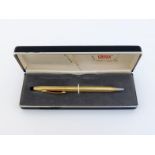 CROSS, a gold plated rollerball pen, in its box, with guarantee CONDITION: good working condition.