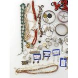 A mixed lot comprising a large quantity of silver, white metal and costume jewellery, sold on behalf