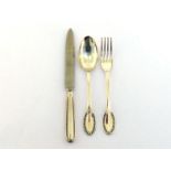 An Italian silver six-place table setting of flatware and cutlery, .800 standard, Padua, pre-1968,