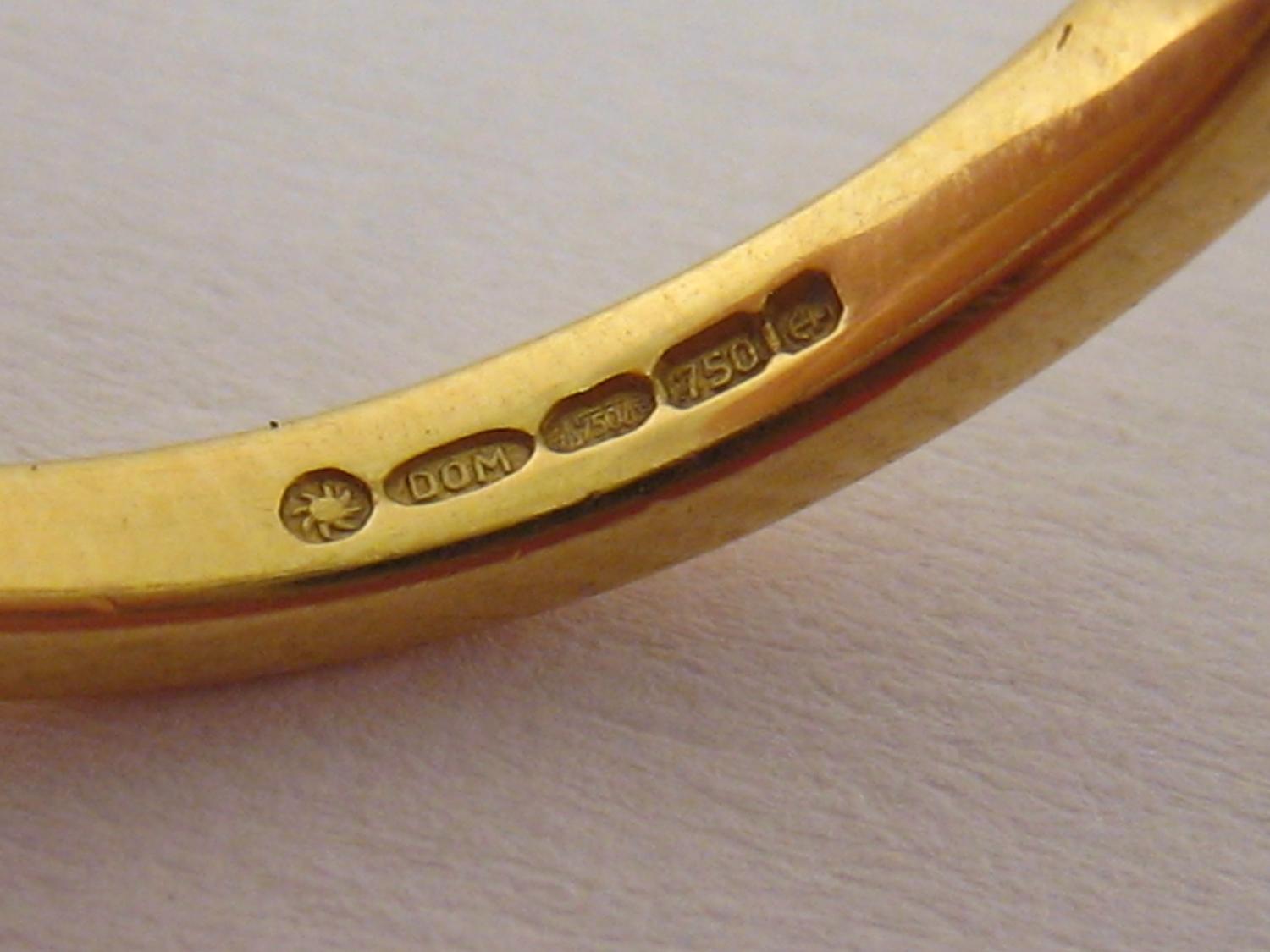 An 18 carat yellow gold and diamond ring, the four uniform brilliants totalling approx. 0.5carat, - Image 2 of 2