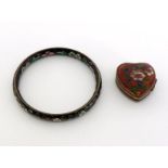 A Chinese cloisonne enamel bracelet, of black ground, with floral motifs overall, 6.4cm diameter,