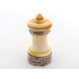 An Edwardian silver-mounted ivory pepper mill, unusually with a pierced ivory grille in the base, by