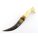 A Mughal ivory-handled dagger, the handle carved as a horse head, the blade and hilt with