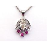 A diamond and ruby pendant, the central marquise cut diamond approx. 1 carat, collet set above three