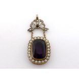 A 19th century amethyst and seed pearl pendant, the large rectangular mixed cut amethyst 18 x