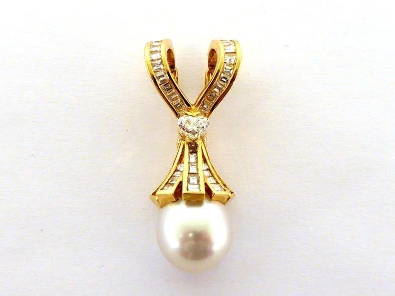 A diamond and South Sea cultured pearl pendant, set to the centre with a heart cut diamond, a 12mm
