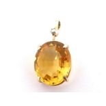 A citrine and diamond pendant, the oval cut citrine approx. 14 carats, claw set, with a rose cut