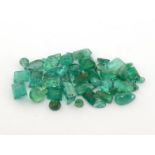 A mixed lot of loose emeralds, various cuts, totalling approx. 16.19 carats. (note: VAT will be