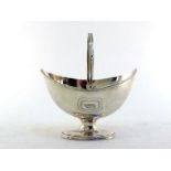 A George III silver swing-handled sugar basket of navette form by Robert Hennell (I), with ribbed