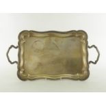 An Italian silver two-handled tray, shaped rectangular with ribbed and moulded edge, .800