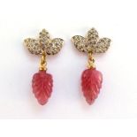 A pair of carved pink sapphire and diamond earrings, the 'tutti frutti' style drops each 14mm