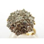 A diamond cluster ring, the cluster composed of 19 uniform brilliants totalling approx. 4.37 carats,
