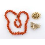 A coral necklace, composed of polished segments, to a gilt clasp, wire strung, 19 gms; together with