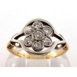 A diamond daisy cluster ring, the cluster composed of seven old brilliants, totalling approx. 0.35