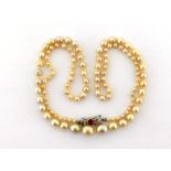 A single strand of natural saltwater pearls, composed of 109 7.4/7.5-2.9/3mm graduated pearls, to