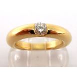 Cartier, Classic, a diamond ring, 1993, rub over set to the centre with a 0.25 carat brilliant,