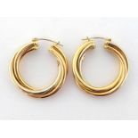 A pair of three colour gold ear hoops, 3.4cm diameter, stamped '750' to the posts, 15.7gms