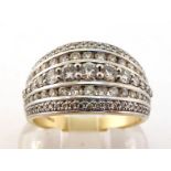 A 9 carat gold and diamond half hoop dress ring, composed of five graduated rows of pave set