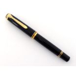 Pelikan 'Souveran', a black resin fountain pen, with fine nib, ink window and piston filler