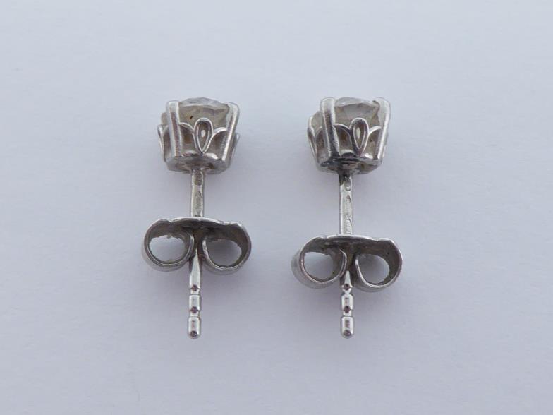 A pair of single stone diamond ear studs, each old brilliant cut stone approx. 0.57 carat, - Image 4 of 6
