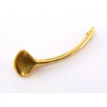 An 18 carat gold hair barrette by Angela Cummings, in the form of lily, 5.6cm, 9.7gms CONDITION: