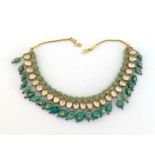 An Indian enamel, turquoise, ruby and diamond fringe necklace, the fringe composed of pear shaped