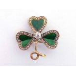 A diamond and enamel clover brooch by Benzies of Cowes, with three green guilloche enamel leaves