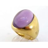 Pomellato 67, an 18 carat gold and amethyst dress ring, the large oval cabochon 20 x 14mm, the heavy