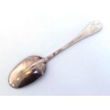 A George I silver rat-tail table spoon, maker's mark indistinct, S? with pellet below, in