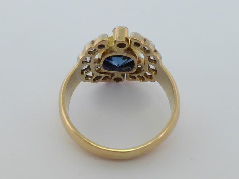 An early 20th century synthetic sapphire and diamond ring, the central round cut sapphire 8 x 4.5mm, - Image 2 of 2