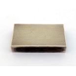 An engine-turned silver rectangular match box holder by Deakin & Francis Ltd., Birmingham, 1979, 8