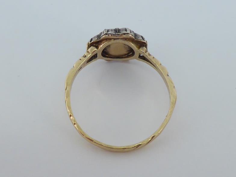 A 19th century diamond cluster ring, the central rose cut 3.8mm diameter, in a surround of smaller - Image 3 of 4