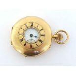 A late Victorian 18 carat gold half hunter 'Greenwich Lever' pocket watch by Kendal & Dent, the four