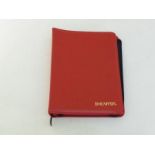 Sheaffer, a red leather pen case, with grey velvet lining, 28 x 36cm