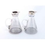 A pair of silver-mounted glass whiskey noggins by Hukin & Heath, Birmingham, 1923, plain tapering