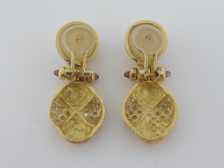 A pair of ruby, diamond and mabe pearl ear clips, the quatrefoil drop pave set with small - Image 2 of 2