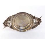 A modern designer silver dish of quaich form with well-modelled unicorn head handles by Sarah Jones,