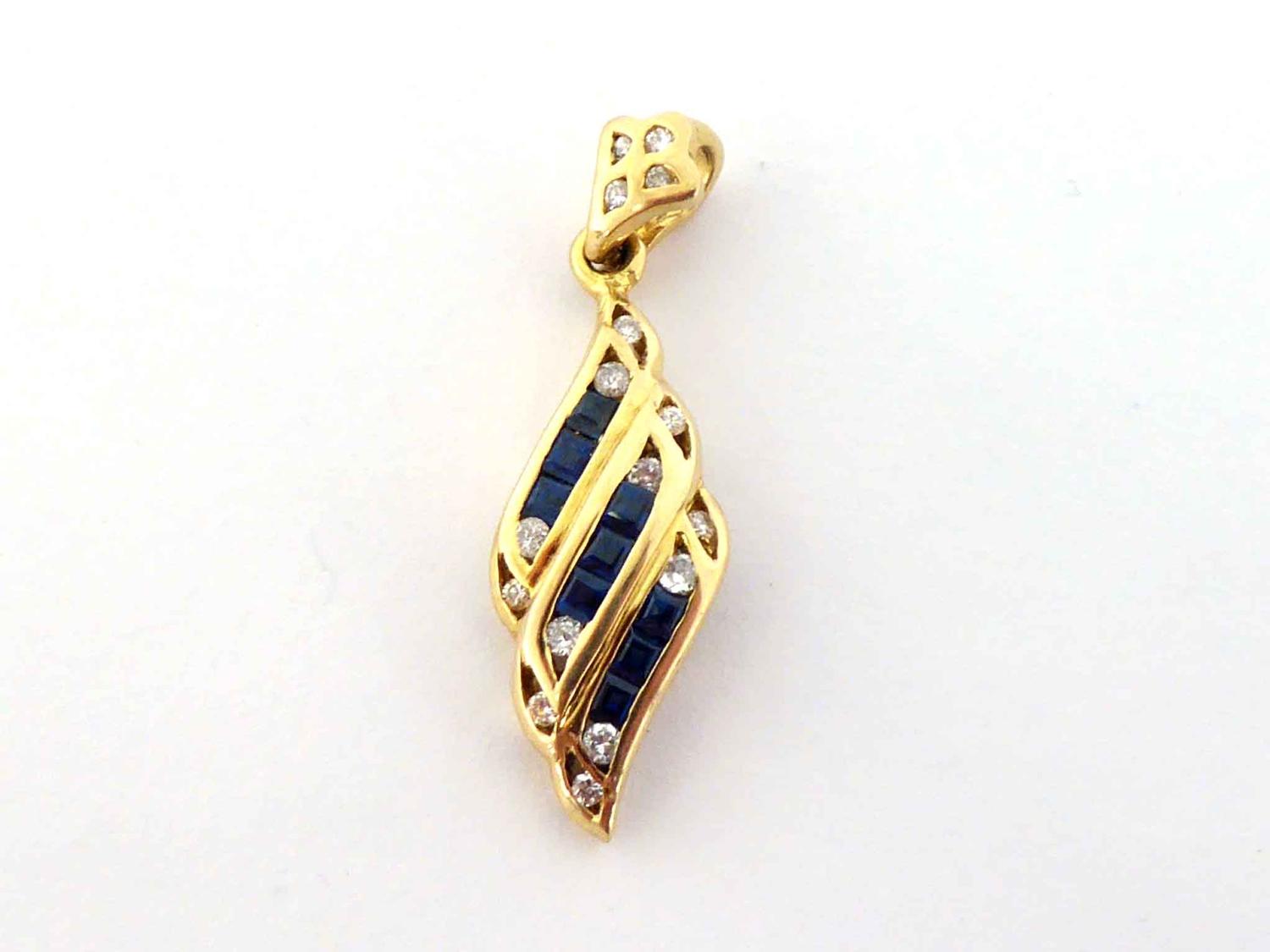 A sapphire and diamond pendant, set with three diagonal rows of calibre cut sapphires, brilliant cut