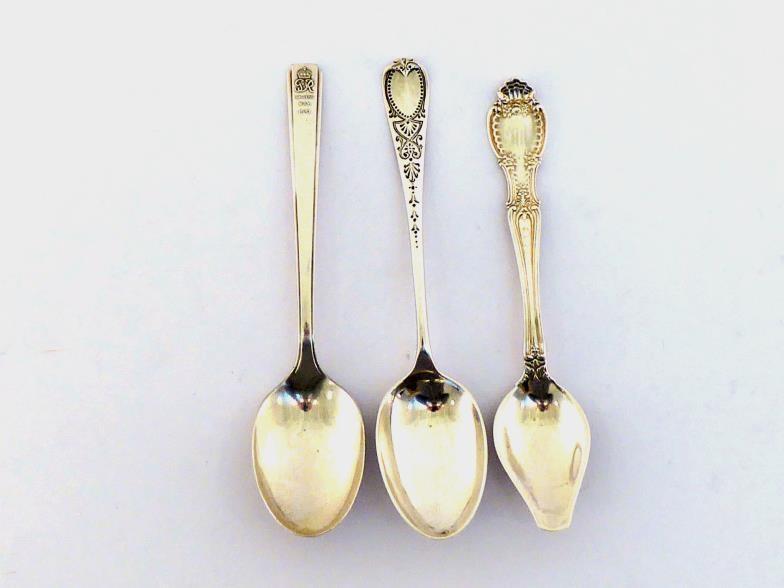 A fancy American silver dessert spoon by Tiffany with English import marks for London, 1909; a