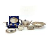 A small group of silver-plated items comprising:- a 3-piece teaset (teapot inscribed with