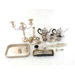 A group of silver plate comprising:- a 4-piece tea 7 coffee set with floral rims; a pair of 3-