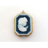 An 18 carat gold and diamond cameo pendant, the canted rectangular resin cameo depicting a woman